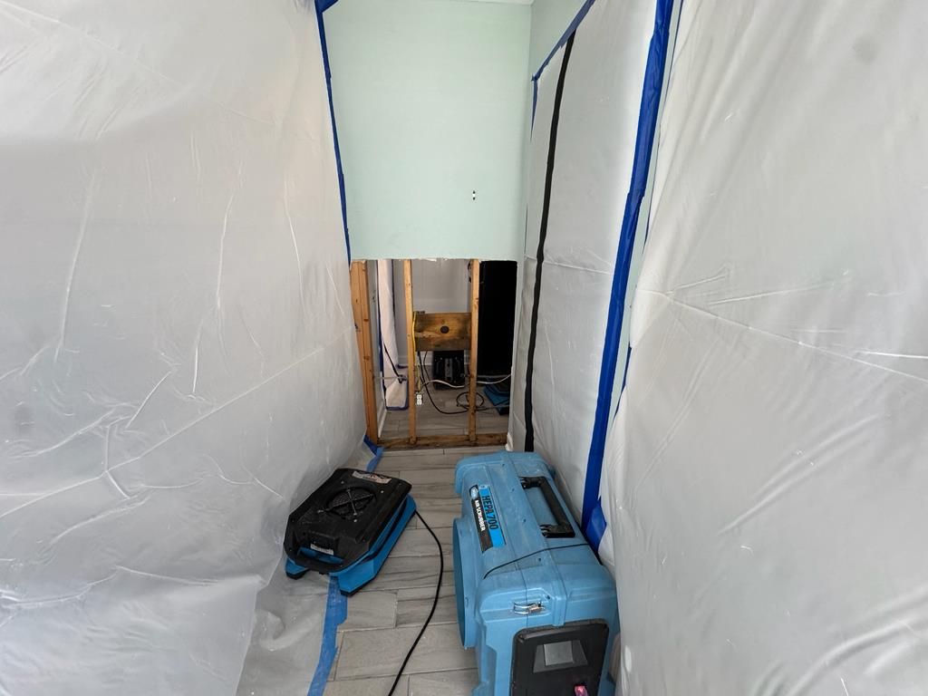 Plastic containment set up during restoration in Murrells Inlet, SC