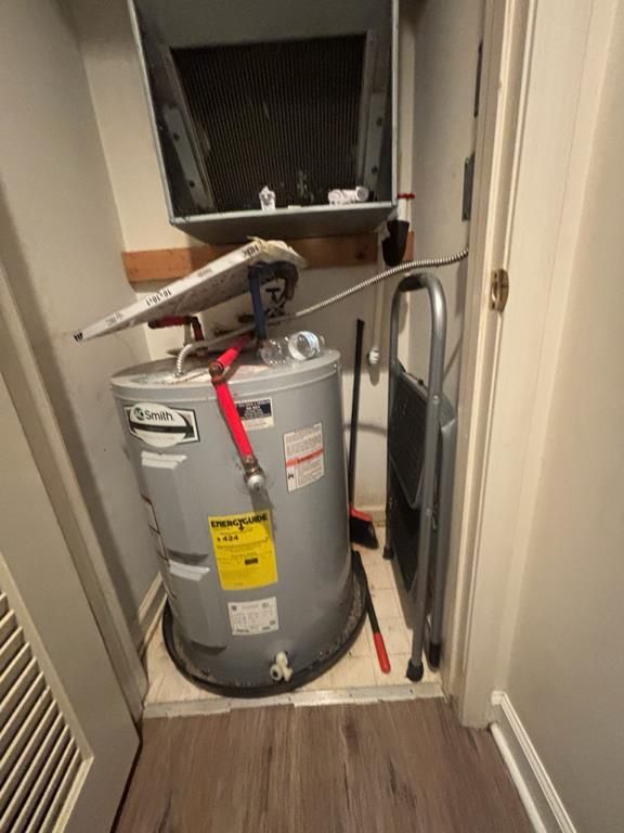 Water heater closet inspected for water damage in Myrtle Beach, SC