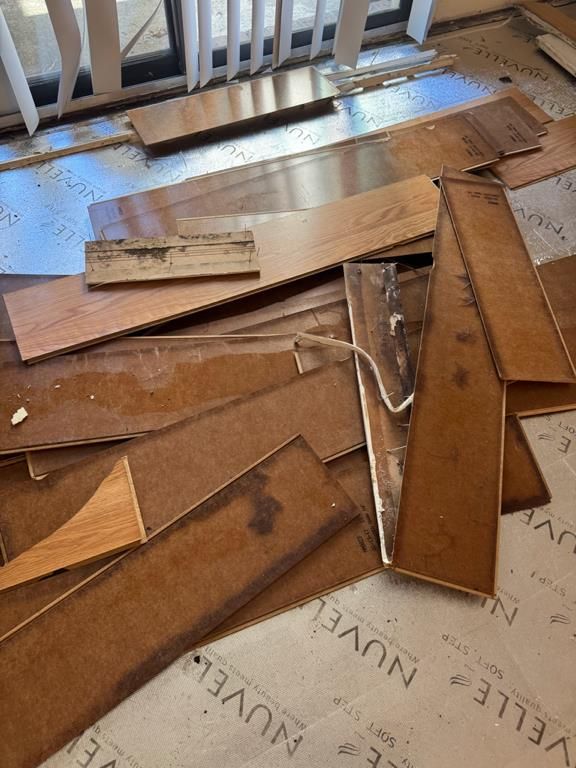 Damaged flooring removed during sewage backup cleanup in Conway, SC